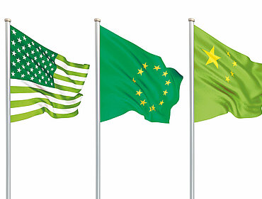 Drei grüne Flaggen: USA, EU und China